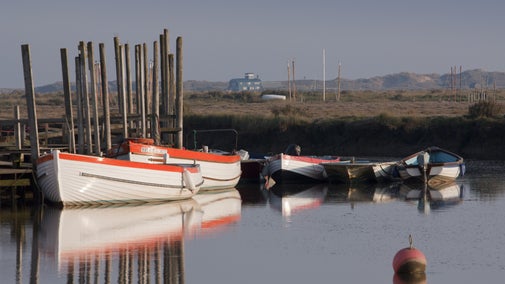Ferry boats at high tide at Morston Quay.
